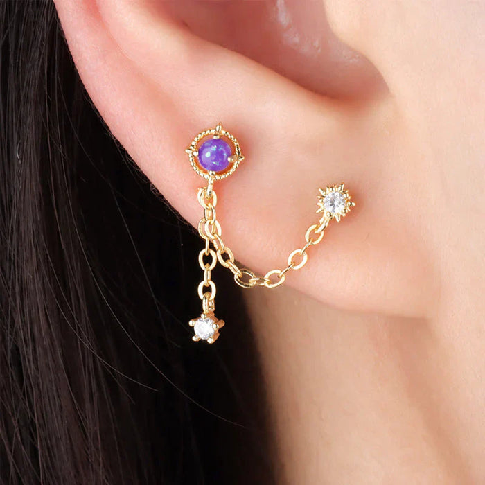 Boucles d'oreilles zircon violet chaîne