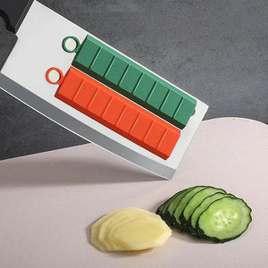 Assistant en silicone pour éviter que les légumes ne collent au couteau